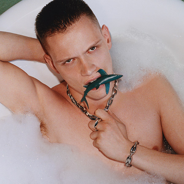 An image of a man wearing jewels from the new Diesel Spring Summer 2025 collection.